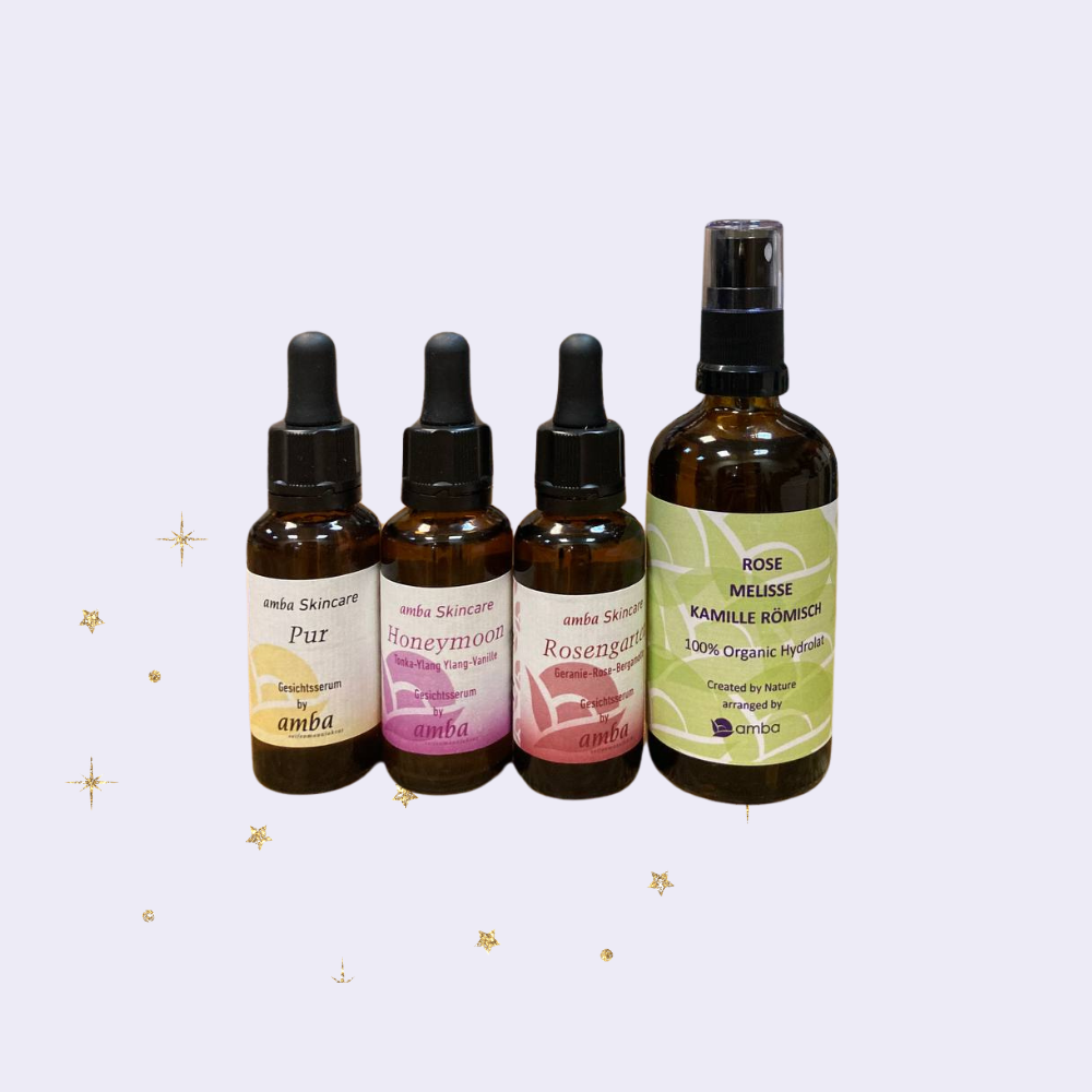 vier Glasflaschen mit Pipette_3 Gesichtsöle a 30ml_Pur_Rosengarten_Honeymoon_und Hydrolat 100ml_Mix aus Melisse_Kamille_Rose